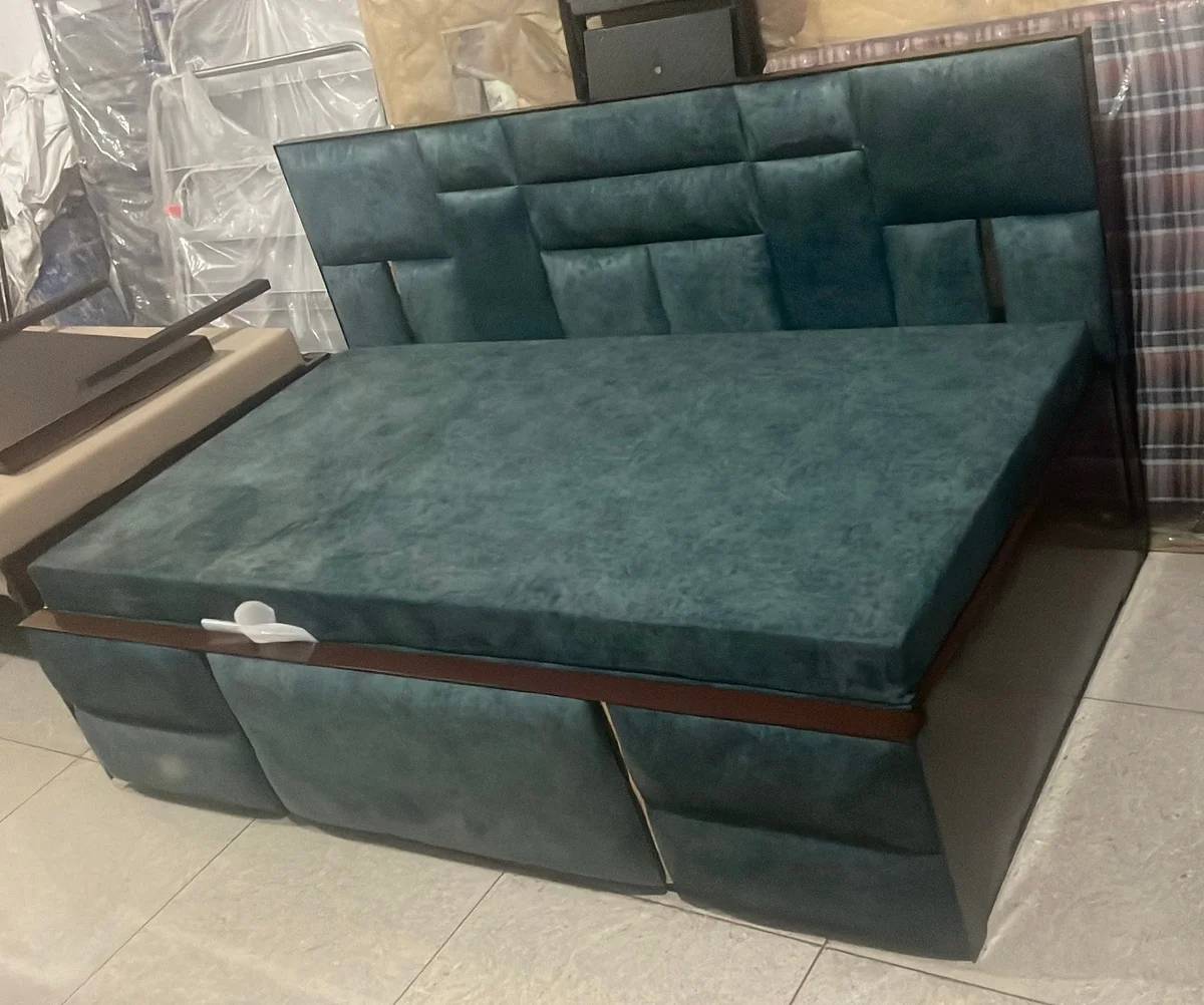 Green upholstered sofa bed