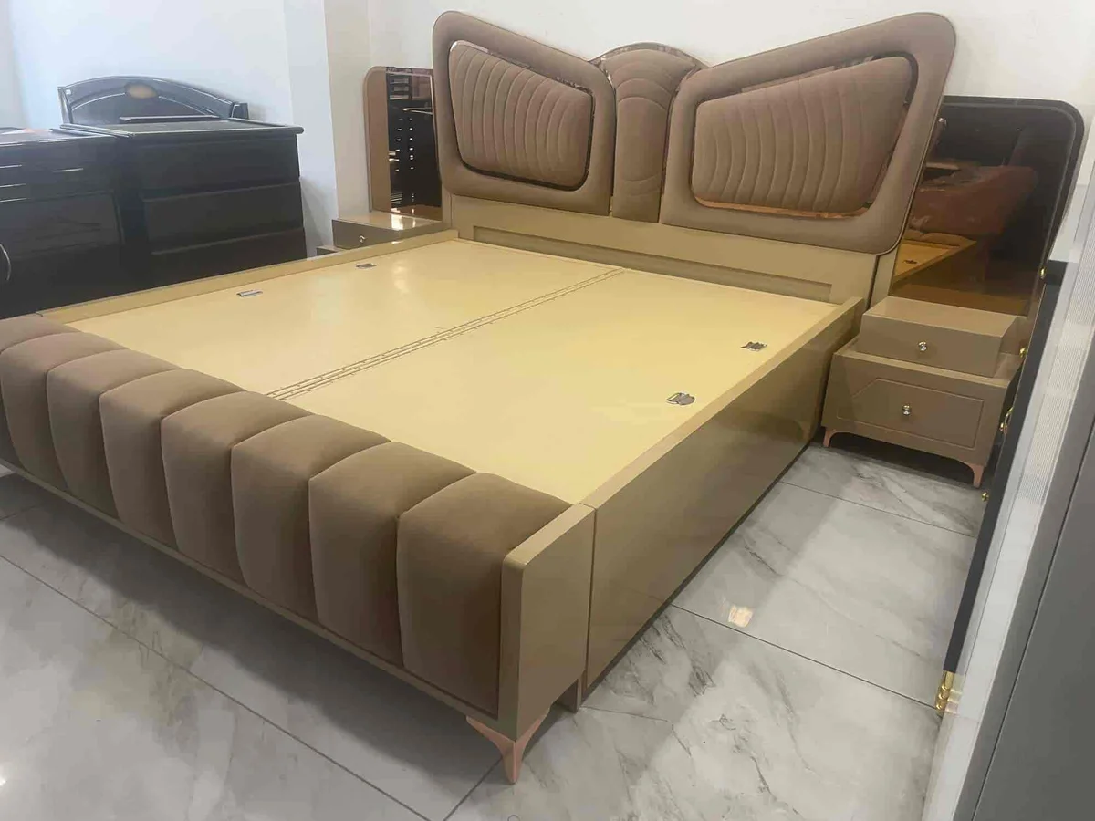 Padded bed and matching bedside storage